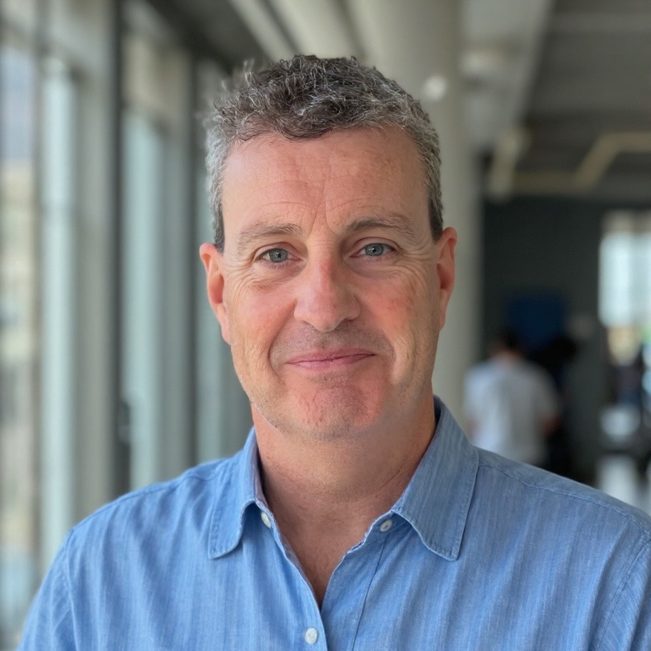 a man in a blue shirt and a blue shirt