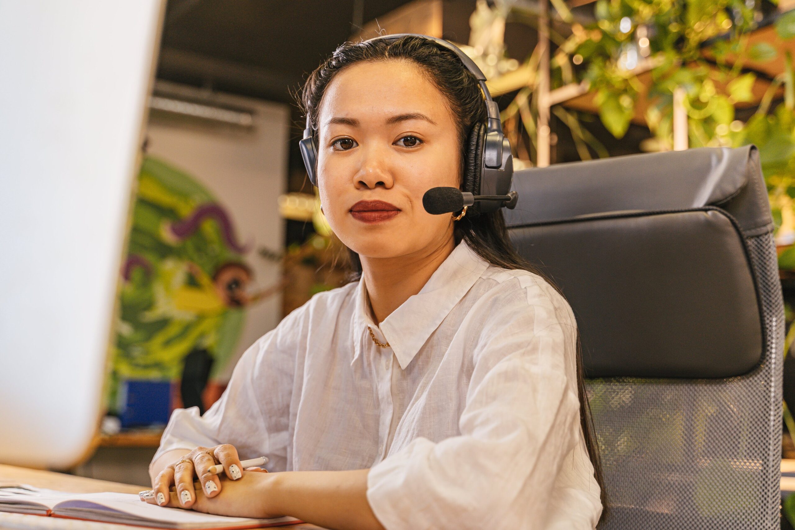 a woman in a headset with a headset and a microphone